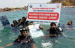 Uttara Kannada DC dives into Sea to distribute Voter ID Cards to Millennials in Karwar